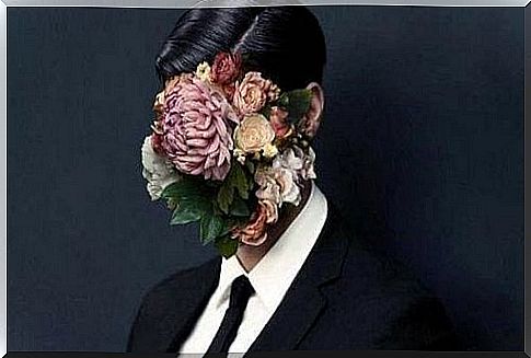 Man with flowers in his face