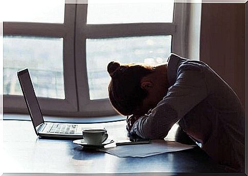 Woman at the computer tired