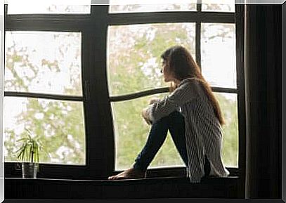 Woman sitting at the window