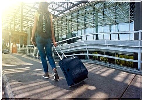 Girl with trolley.