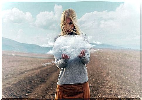 Woman with cloud in her hands