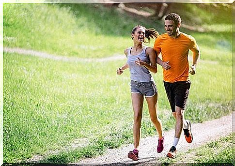 Couple running outdoors.