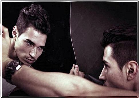 Man looking in the mirror