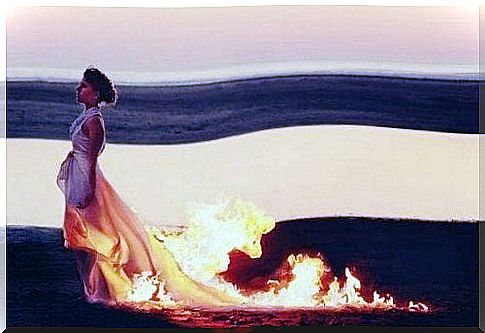 Girl in a fiery dress, a symbol of self-destructive people