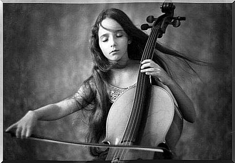 Little girl playing the cello